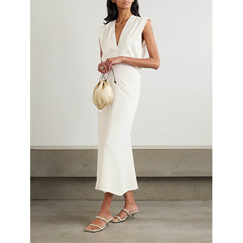 Skreddersydd elfenben ermeløs dyp V Midi-kjole